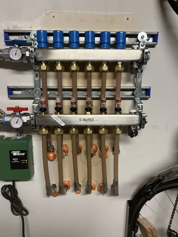 Plumber performing Gas Line Installation at a residential property in Highland Village